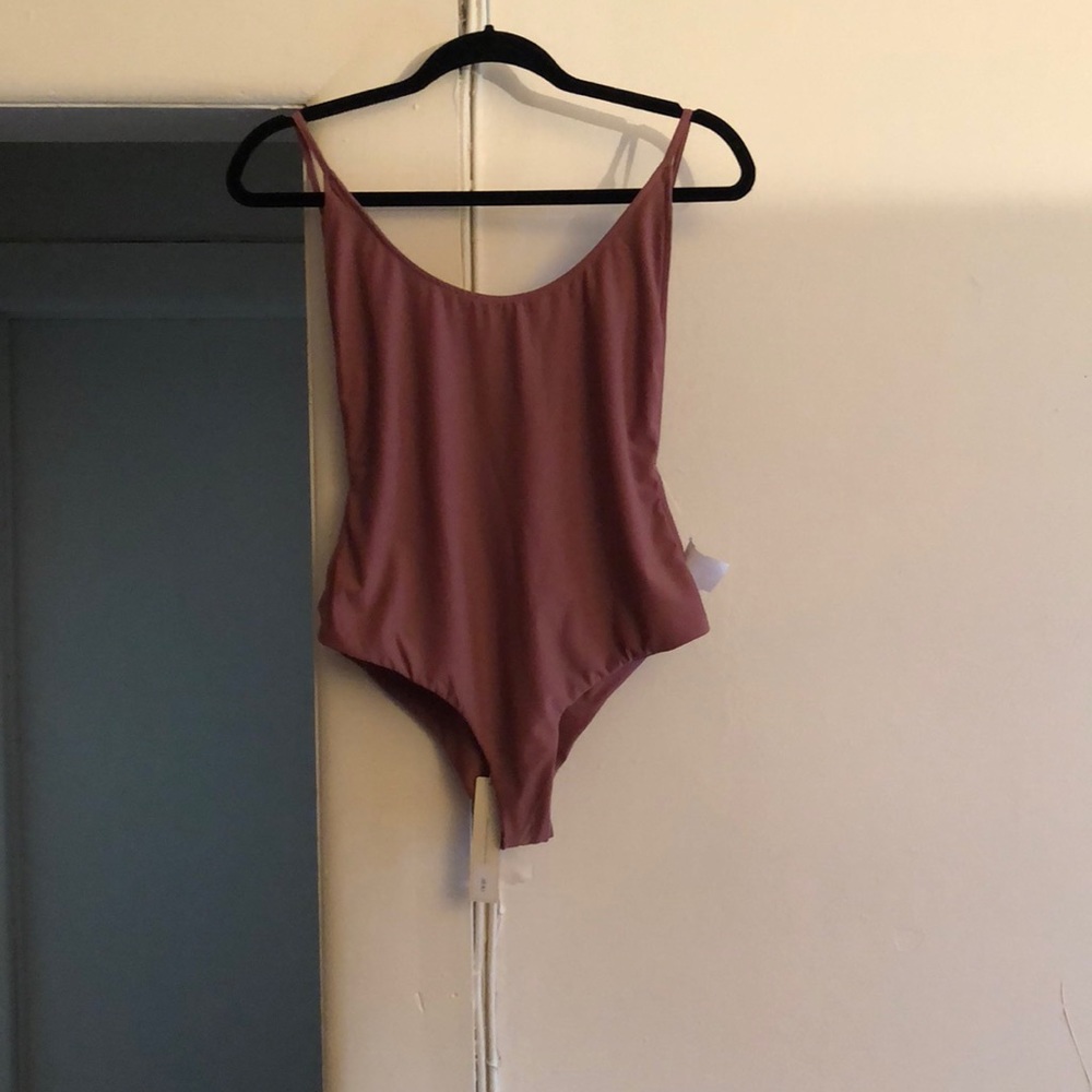 Pretty pinky nude bodysuit